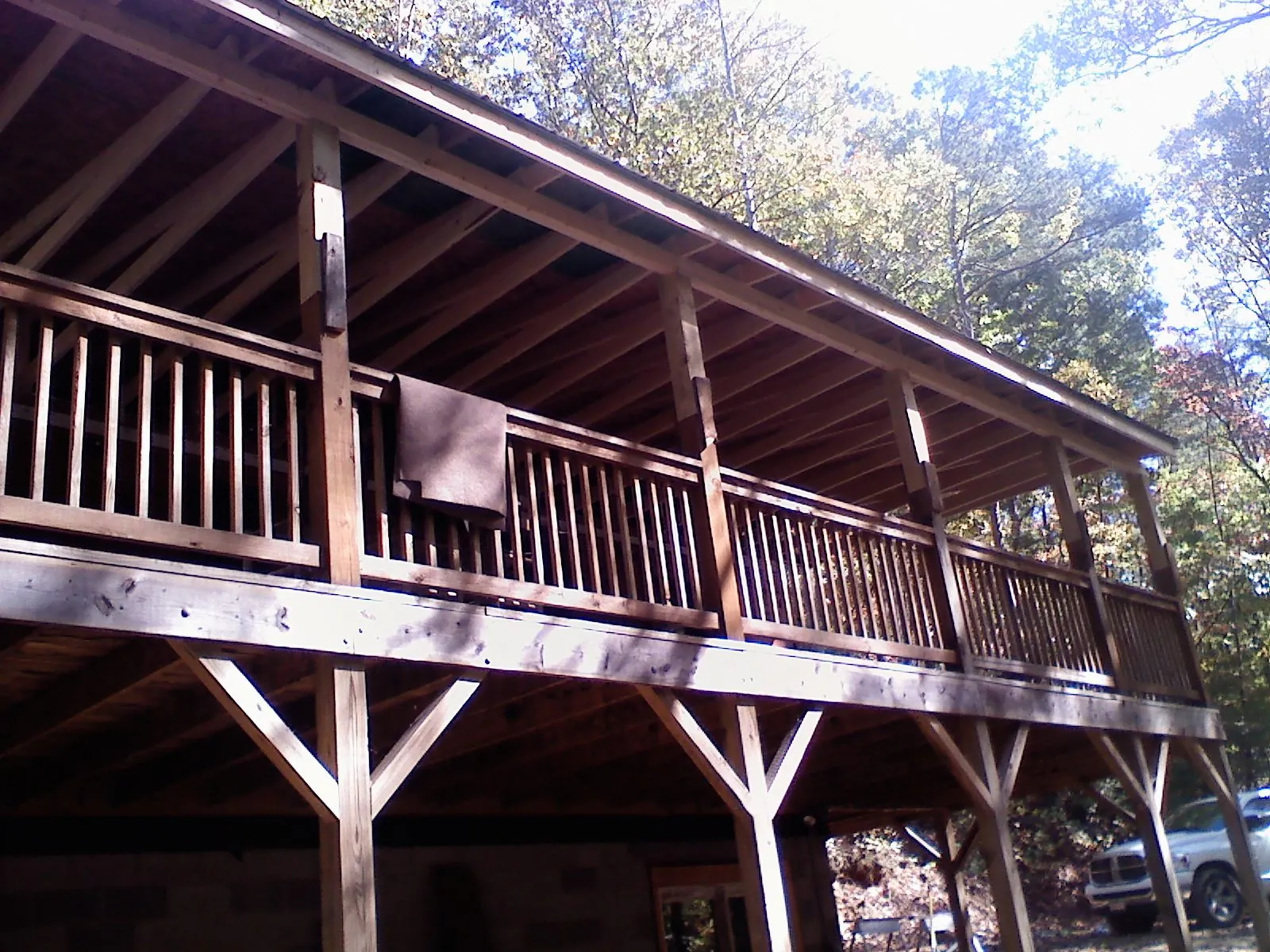 Timber framing under a new elevated porch and deck — Roof Leak Repair in Sandy Creek by Roofing Brothers